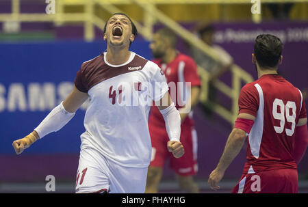 (180831) -- JAKARTA, 31 août 2018 (Xinhua) -- Yousef Ali du Qatar célèbre au cours de handball masculin médaille d'or lors de la 18e Jeux asiatiques à Jakarta, Indonésie, le 31 août 2018. (Xinhua/Fei Maohua) Banque D'Images