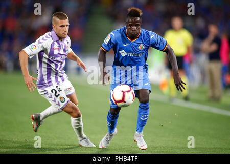 Amath, marche avant de Getafe CF, et le milieu de terrain de Keko, Real Valladolid, au cours de la ligue espagnole, La Liga, match de football entre Getafe et Real Valladolid le 31 août 2018 au Coliseum Alfonso Perez stadium à Getafe, Madrid, Espagne. 4 juin, 2016. Credit : AFP7/ZUMA/Alamy Fil Live News Banque D'Images