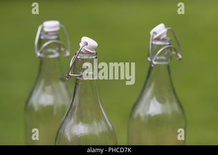 Trois vieilles bouteilles de lait authentique Banque D'Images