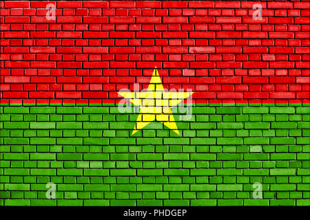 Drapeau du Burkina Faso a peint sur mur de brique Banque D'Images