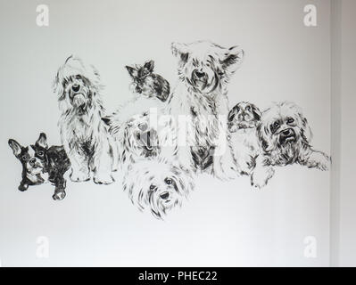 Groupe de chiens de peinture à base de lapin, noir et blanc acrylique sur mur de ciment gris.pour la décoration ou le mémorial de l'animal avec le propriétaire. Banque D'Images