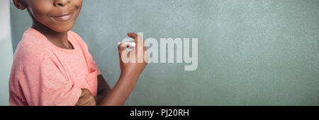 Portrait of boy panneau greenboard par Banque D'Images