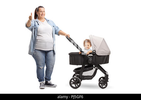 Portrait D Une Mere En Surpoids Avec Une Poussette Et Bebe Showing Thumbs Up Isole Sur Fond Blanc Photo Stock Alamy