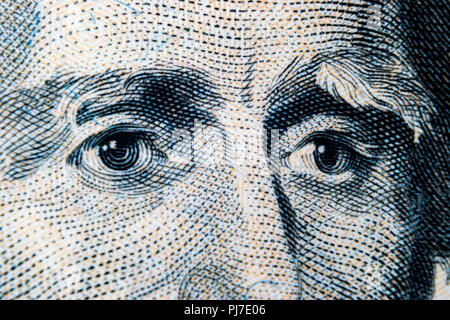 Voir Portrait d'Andrew Jackson sur l'un de vingt dollars. Arrière-plan de l'argent. 20 dollar bill avec Andrew Jackson yeux macro shot. M Banque D'Images