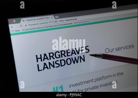 Le site web de Landsdowne Hargreaves vu à travers une loupe Banque D'Images