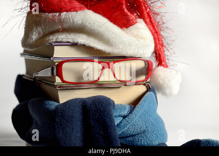 Lunettes de lecture hiver concept avec books Banque D'Images