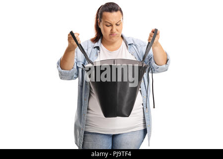 Triste de l'embonpoint à la femelle dans son sac à main isoated on white background Banque D'Images