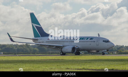 Vol de Westjet à destination de Halifax Nouvelle-Écosse vu se préparer au départ et l'Aéroport International de Glasgow. Il s'agissait d'un vol d'initiation qui ha Banque D'Images