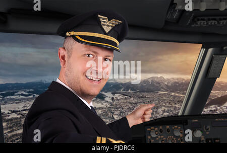 Heureux pilot in cockpit Banque D'Images