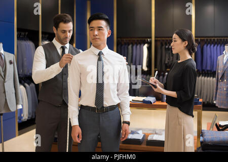 Les créateurs de mode en mesure de la Banque D'Images