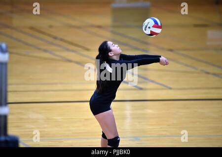 La tenue d'un joueur de volley en vie au cours d'un long point. USA. Banque D'Images