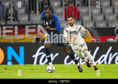 Munich, Allemagne. 06 Sep, 2018. Paul POGBA (#  6, FRA) en face de l''Ilkay GUENDOGAN (GvúNDOGAN (#  21), GER). Soccer Laenderspiel, Allemagne (GER) - France (FRA) 0 : 0, Ligue de l'UEFA, la saison 2018/2019, le 09/06/2018 à Muenchen/ALLIANZARENA/Allemagne. Note de rédaction : DFB règlement interdit toute utilisation des photographies comme des séquences d'images et/ou quasi-vidéo. ¬ | Conditions de crédit dans le monde entier : dpa/Alamy Live News Banque D'Images