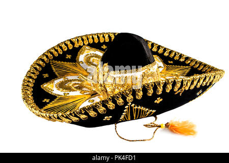 Noir avec garniture en or Mexican Hat isolé sur fond blanc, Sombrero de fantaisie. Banque D'Images