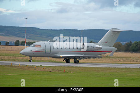 La maltaise Canadair Challenger 605 Vistajet 9H-VFA arrivant à l'aéroport de Inverness Dalcross. Banque D'Images