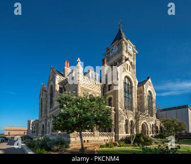 Palais de justice du comté de Victoria (1892), de style néo-roman, à De Leon Plaza, Victoria, Texas, États-Unis Banque D'Images