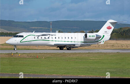 Un Bombardier Challenger 850 Reg 9H-BOO visite à l'aéroport d'INVERNESS Inverness, dans les Highlands écossais au Royaume-Uni. Banque D'Images