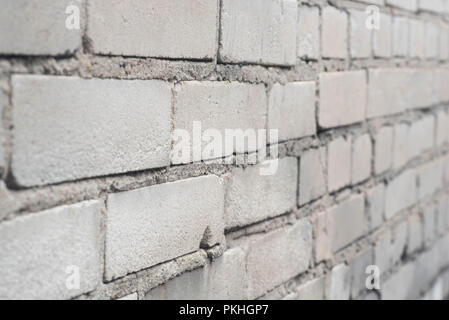Vieux mur de briques gris texture d'arrière-plan Banque D'Images