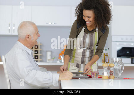 Ce qui porte à des repas soignant Banque D'Images