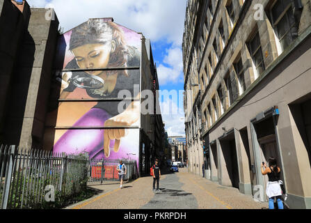 Le centre-ville de Glasgow, sentier murale où les artistes de rue ont égayé de cour, et panneaux publicitaires autour de terrains vagues, en Ecosse, Royaume-Uni Banque D'Images