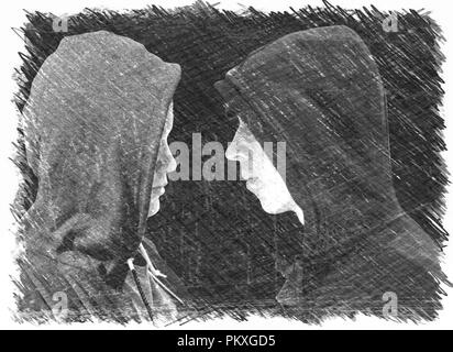 Deux adolescents en difficulté avec capuche noir debout en face de l'autre en profil isolé sur fond noir. Exprimer le charbon noir et blanc Banque D'Images