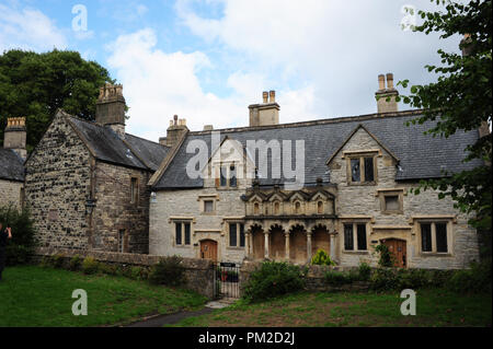 Wells, Grossbritannien. Août 13, 2018. Poorhaueser historique dans les environs de l'église paroissiale de puits dans le sud de l'Angleterre, prise en août 2018 dans le monde de l'utilisation | Credit : dpa/Alamy Live News Banque D'Images