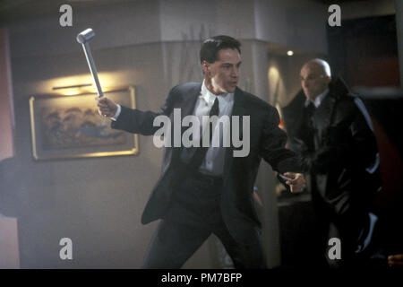 Photo du film de 'Johnny Mnemonic Keanu Reeves' © 1995 TriStar Pictures Photo Credit : Takashi Seida Référence #  31043297THA pour un usage éditorial uniquement - Tous droits réservés Banque D'Images