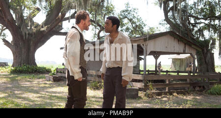 Michael Fassbender comme 'Edwin Epps' et Chiwetel Ejiofor comme 'Solomon Northup' dans 12 ans un esclave. Banque D'Images