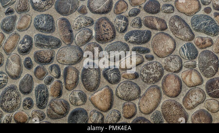 fond de texture en béton de pierre de gravier. gros plan de pierres de galets utilisées pour l'intérieur et l'extérieur Banque D'Images