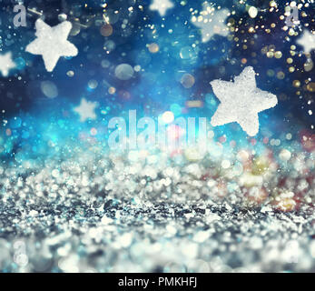 Abstract glowing fond bleu avec étoile de Noël Banque D'Images