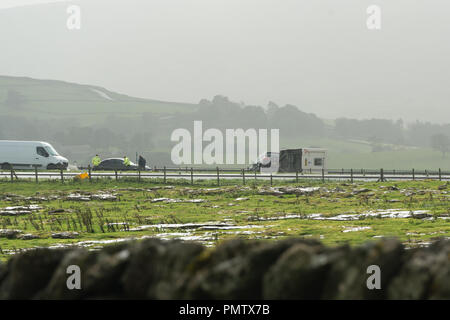 A66 Stainmore Cumbria, Mer 19 Septembre 2018 - Ali tempête provoquant une interruption de voyage. Une voiture et caravane a été soufflé sur le blocage de l'A66 nr Stainmore Cafe en Cumbria, WittWooPhoto Crédit/Alamy Live News Banque D'Images