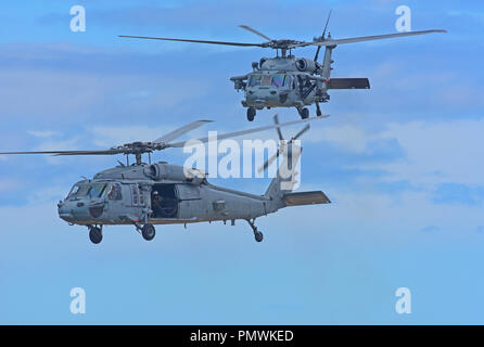 USNAVY MH-60 Seahawk hélicoptère sur entraînement au tir de l'exercice dans certaines limites, de prendre l'avion à partir de la base de la RAF à Lossiemouth dans Moray, en Écosse. Banque D'Images