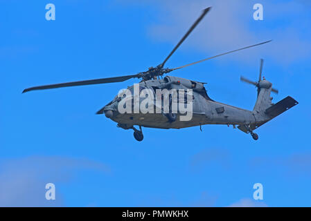 USNAVY MH-60 Seahawk hélicoptère sur entraînement au tir de l'exercice dans certaines limites, de prendre l'avion à partir de la base de la RAF à Lossiemouth dans Moray, en Écosse. Banque D'Images