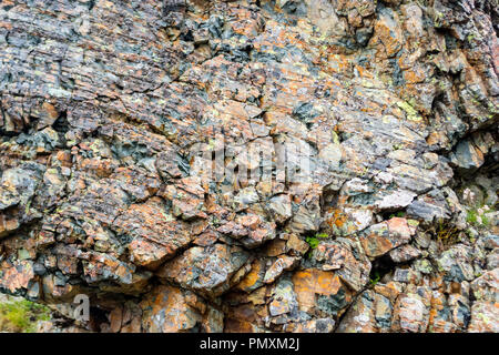 Texture de fond d'un brun gris pierre sur le rocher de la montagne découvert lors de fouilles archéologiques comme un monument à des millions d'années o Banque D'Images