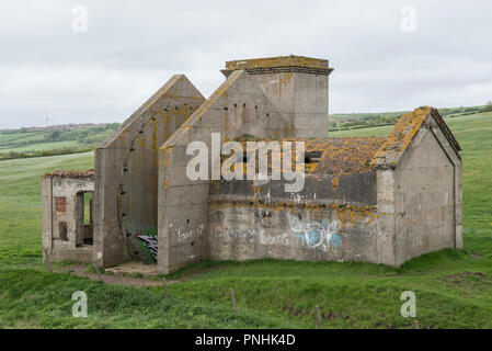 Vestiges de la maison de Huntcliff ventilateur à côté de la mine de fer à Skinningrove, North Yorkshire, Angleterre. Banque D'Images