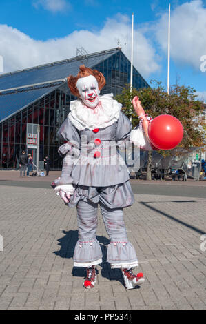 Glasgow, Ecosse, Royaume-Uni. 23 Septembre, 2018. Cosplayeur habillé en clown, la danse Pennywise un personnage du roman d'horreur IL par Stephen King, arrivant le jour deux de la MCM Ecosse Comic Con tenu au SEC Centre. Credit : Skully/Alamy Live News Banque D'Images