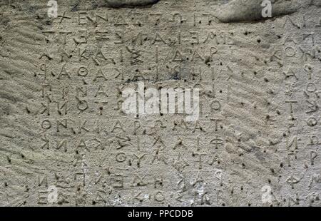 L'écriture de Doria. Gortyn Code. 5ème siècle BC. Texte gravé sur le mur d'un Odeion romain. Gortyn. La Crète. La Grèce. Banque D'Images