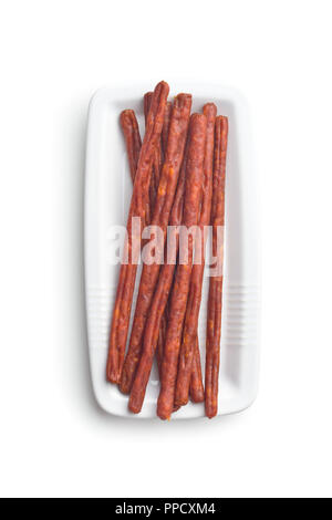 Sticks Snack saucisse. Snack-Chorizo isolé sur fond blanc. Banque D'Images