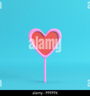 Rose avec un cœur rouge sur un bâton lumineux sur fond bleu pastel. Le minimalisme concept. 3D render Banque D'Images