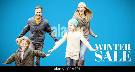 Image composite de cute family s'exécute dans un parc Banque D'Images