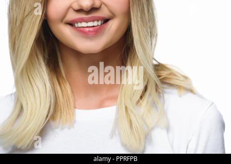 Portrait of smiling girl in white shirt isolated on white Banque D'Images