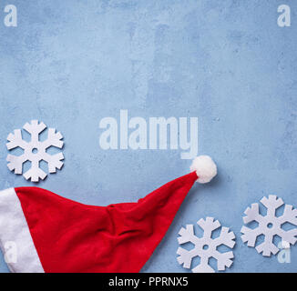 Christmas background with Santa hat Banque D'Images
