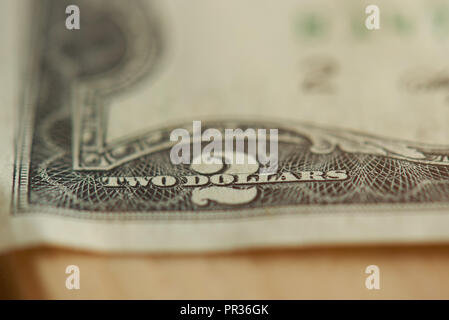 Deux billets dollar close up sur coin avec nombre Banque D'Images