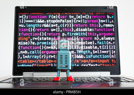 Robot à l'écran de code source, l'intelligence artificielle, l'apprentissage en profondeur concept Banque D'Images