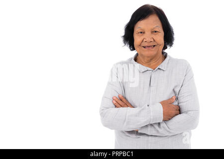 Senior woman with arms crossed isolé sur fond blanc Banque D'Images