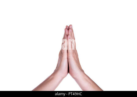 Woman's hands priant sur un fond blanc. La foi et la pureté concept Banque D'Images