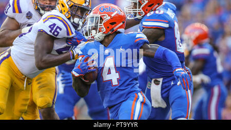 6 Oct - Gainesville, FL, États-Unis : Florida Gator d'utiliser de nouveau Kadarius Toney (4) exécute la balle pendant la deuxième moitié de NCAA football action contre la LSU Tigers de l'Université de Floride. (Gary Lloyd McCullough/Cal Sport Media) Banque D'Images