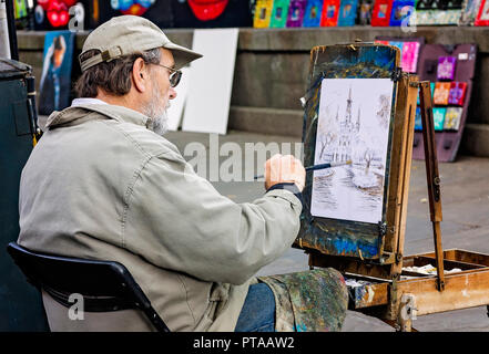 Un artiste peint Cathédrale St Louis à Jackson Square, 11 novembre 2015, à la Nouvelle Orléans, Louisiane. (Photo de Carmen/Cloudybright) Sisson K. Banque D'Images