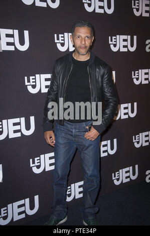 Paris, France. 9 octobre, 2018. Roschdy Zem vu posant pour une photo lors de la première Le Jeu au cinéma UGC Normandie. Credit : Thierry Le Fouille/SOPA Images/ZUMA/Alamy Fil Live News Banque D'Images