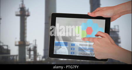 Image 3D composite des mains toucher digital tablet against white background Banque D'Images