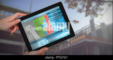 Image 3D composite de hands holding digital tablet against white background Banque D'Images